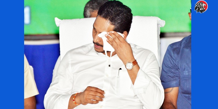 Jagan Wipes Face With Mask